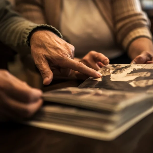 Demenia Reminiscing Couple looking at old photos